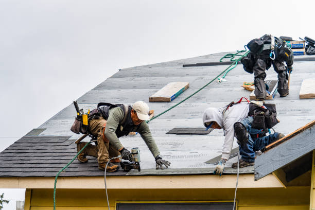 Professional Gutter Installation technician working in Perkins, OK